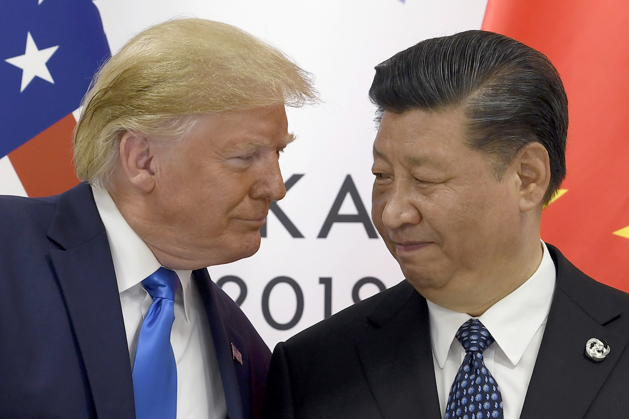 US President Donald Trump (left) meets with Chinese President Xi Jinping during a meeting on the sidelines of the G-20 summit on June 29, 2019 in Osaka, Japan. (AP)