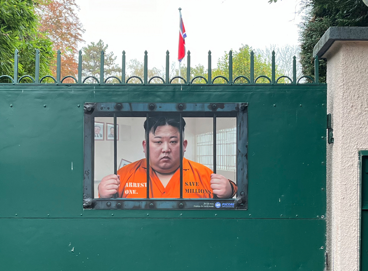 A poster is displayed at the North Korean Permanent Mission to the United Nations in Geneva on Wednesday. (Jeski Social Campaign)