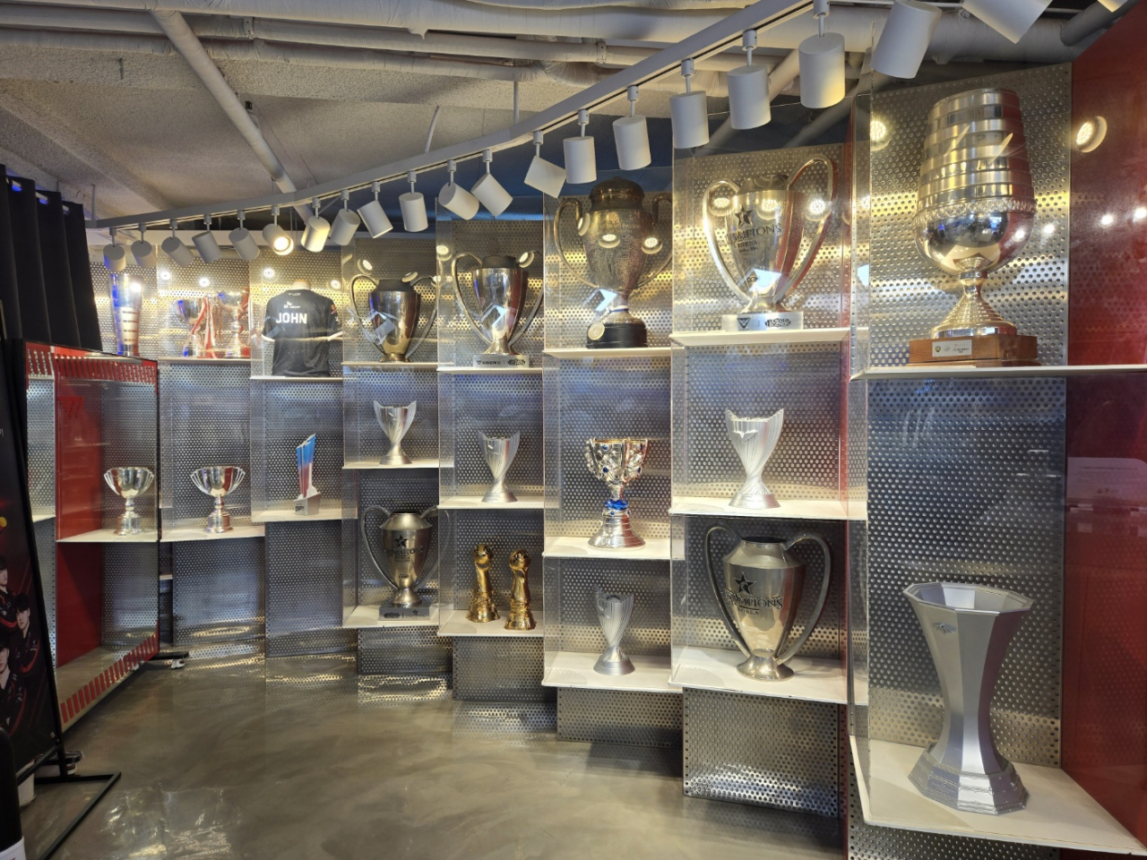 T1's championship trophies are displayed at T1 HQ Shop in Gangnam, southern Seoul. (Lee Si-jin/The Korea Herald)