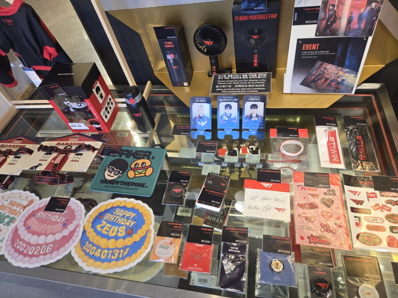 Different T1-themed merchandise is offered at T1 HQ Shop in Gangnam, southern Seoul. (Lee Si-jin/The Korea Herald)