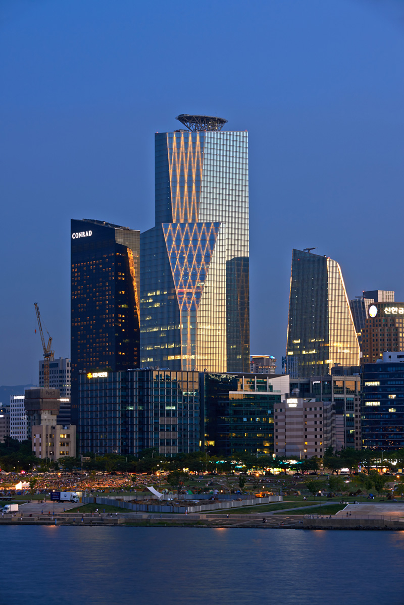 The office towers and the Conrad Seoul hotel of IFC Seoul stand in Yeouido, Seoul, alongside other buildings. (IFC Seoul)