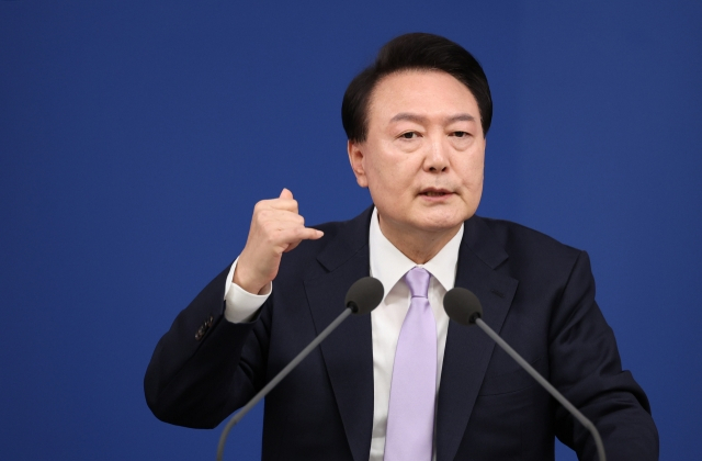 South Korean President Yoon Suk Yeol speaks during a televised address and press conference marking the second half of his term at the presidential office in Yongsan, central Seoul on Thursday. (Yonhap)