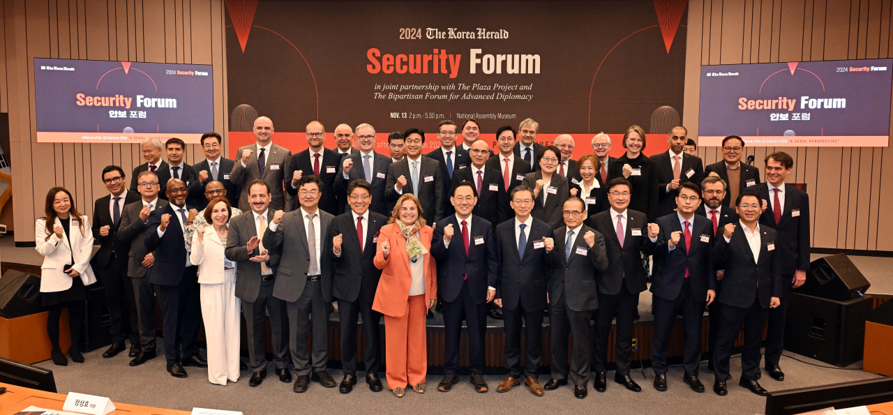 Lawmakers, ambassadors, panelists and speakers pose for a photo at the Korea Herald Security Forum 2024 at the National Assembly Museum in Seoul on Wednesday. (Lee Sang-sub/The Korea Herald)