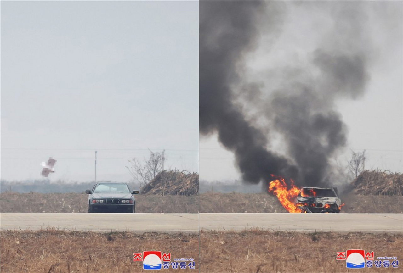 A target resembling a BMW sedan is shown exploding after being hit by a suicide attack drone during a performance test under the supervision of North Korean leader Kim Jong-un on Thursday, in this image provided by the state-run Korean Central News Agency on Friday. Photo courtesy of Yonhap, compiled by The Korea Herald.