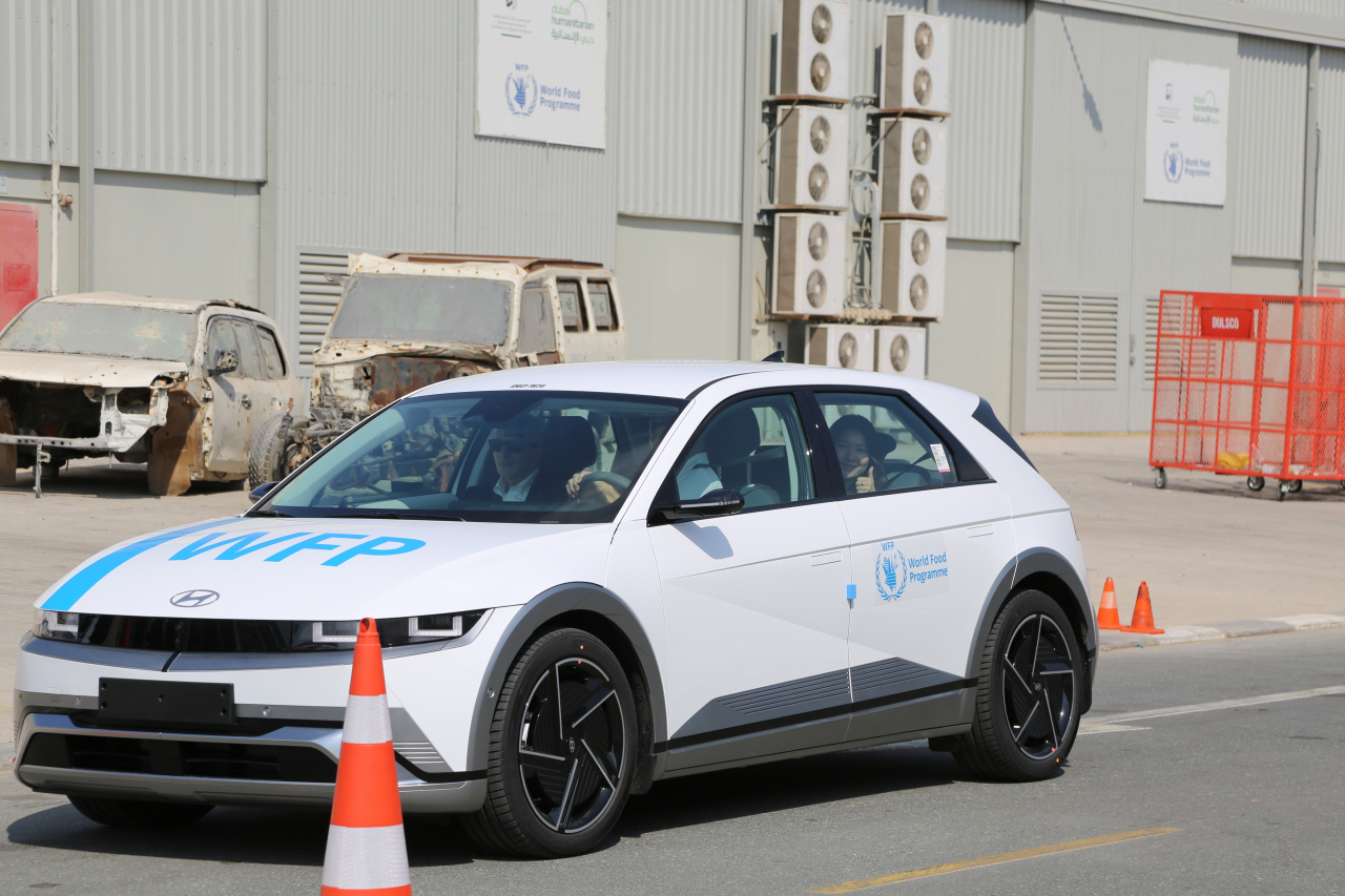 WFP staff take Hyundai’s donated Ioniq 5 vehicles for a test drive as part of the handover ceremony. (Hyundai Motor Group)