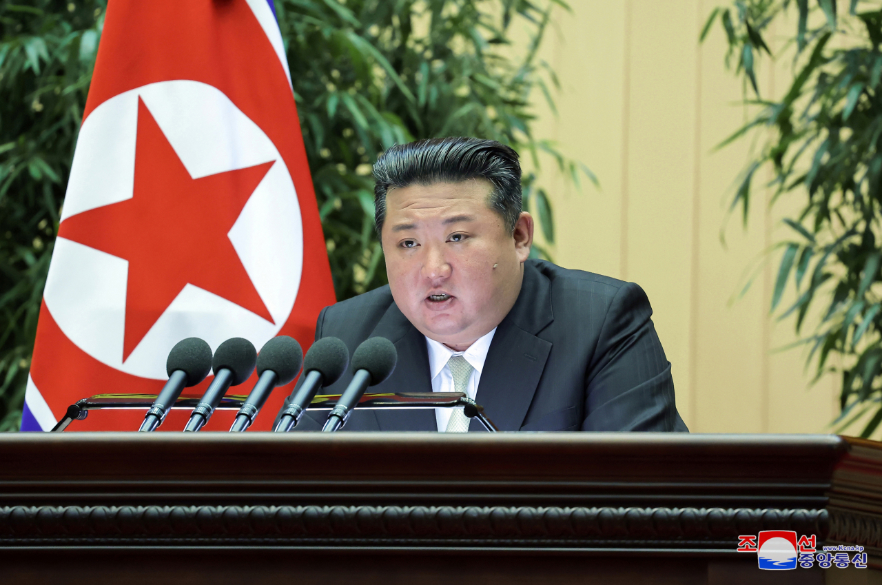 This photo, carried by North Korea's official Korean Central News Agency on Nov. 18, Monday, shows the North's leader Kim Jong-un speaking at the 4th Conference of Battalion Commanders and Political Instructors of the Korean People's Army on Nov. 15, the final day of the two-day event held in Pyongyang. (KCNA)