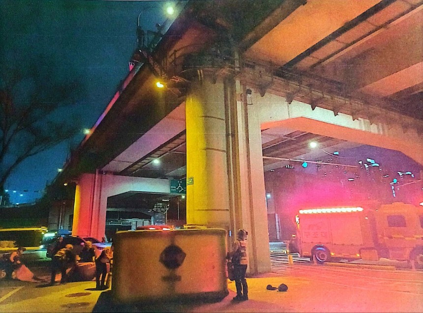 This photo provided by Seoul police shows rescue authorities installing a giant air mattress beneath the Banpo Bridge over the Han River in Seoul, Saturday. (Seoul Seocho Police Station)