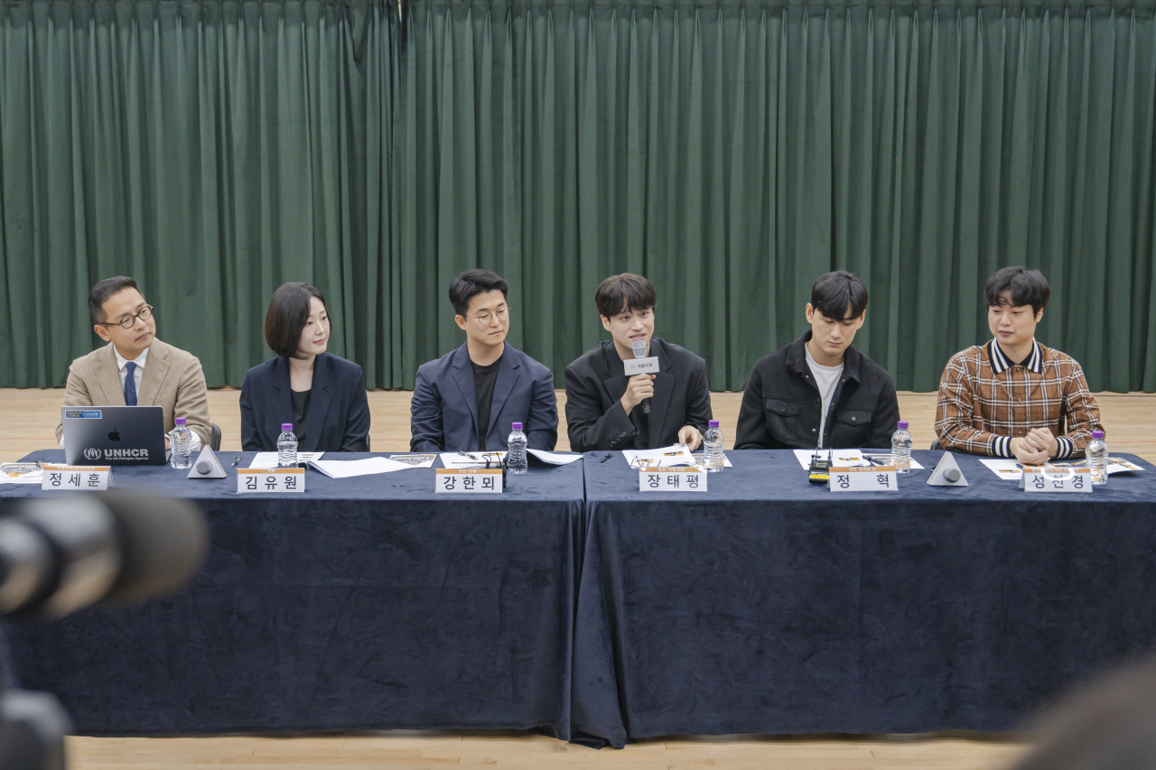 From left: AK Interactive director Chung Se-hoon, conductor Kim Yu-won and composers Kang Ham-moi, Jang Tae-pyeong, Jung Hyuk and Seong Chan-kyeong participate in a press conference on Oct. 31 at the National Theater of Korea. (The National Theater of Korea)