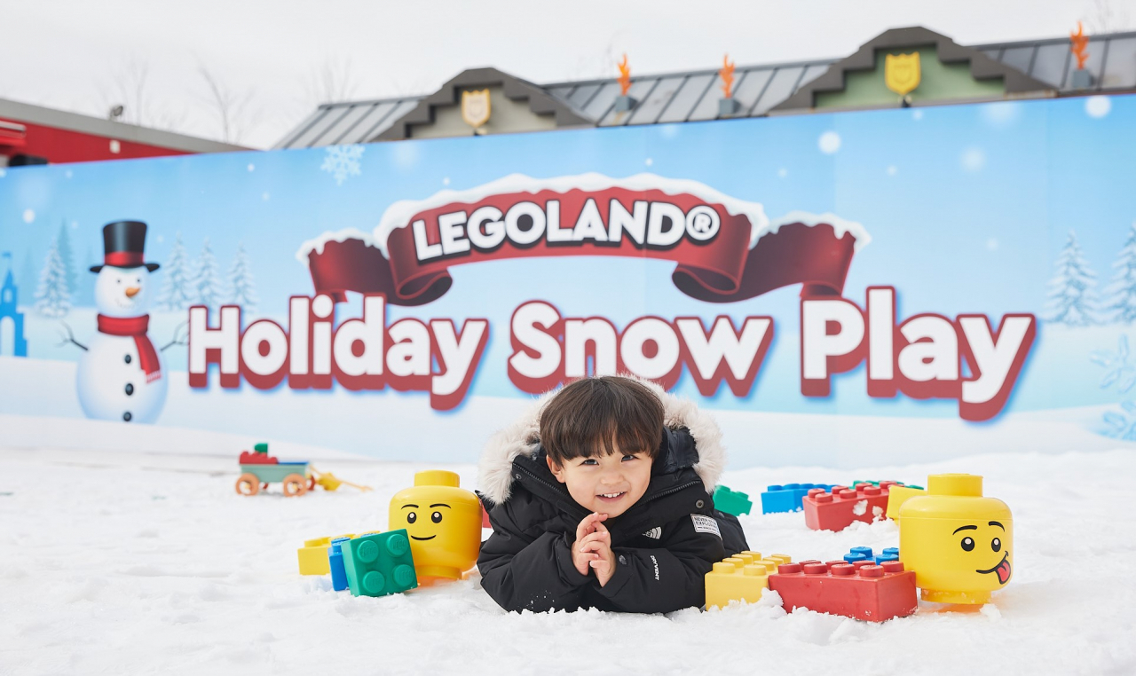 A child poses for photos at Legoland Korea Resort's new Holiday Snow Play attraction. (Legoland Korea Resort)