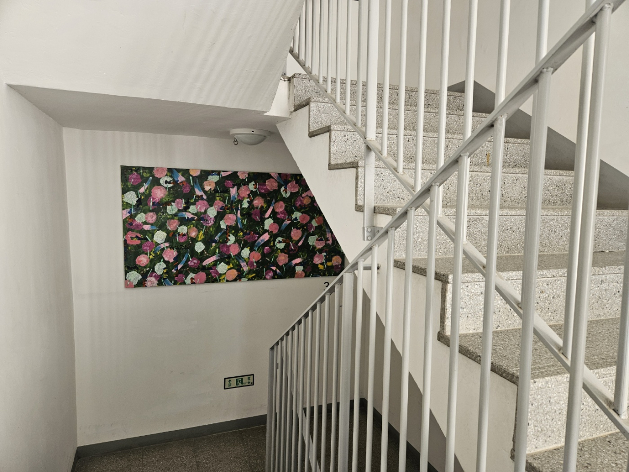 A staircase used as an exhibition space at Malli-dong Public Housing for artists in Seoul. (Park Yuna/The Korea Herald)