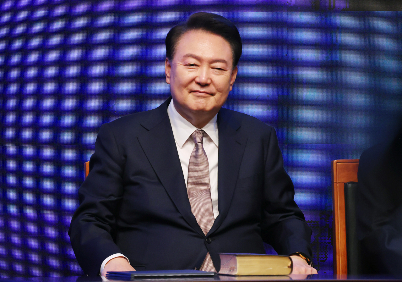 President Yoon Suk Yeol attends the Korea National Prayer Breakfast at a hotel in Seoul on Friday. (Yonhap)