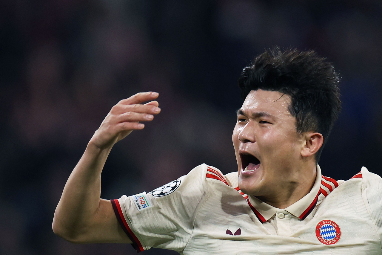 Kim Min-jae of Bayern Munich celebrates after scoring the decisive goal against Paris Saint-Germain during a league phase match at the UEFA Champions League at Allianz Arena in Munich, Germany, on Tuesday. (AFP-Yonhap)