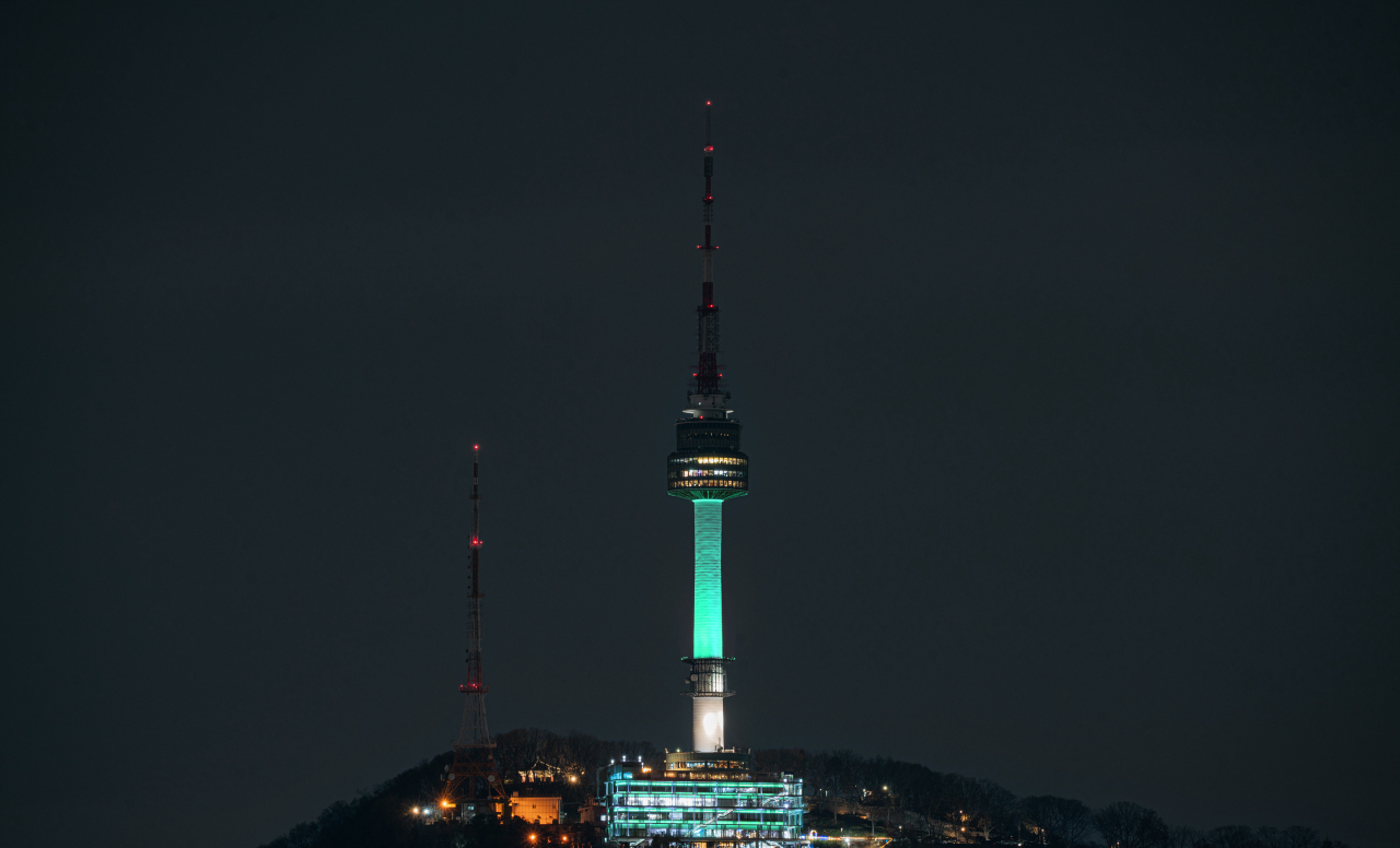 The N Seoul Tower in Yongsan-gu, central Seoul, is lit up in green aurora. (Seoul Metropolitan Government)