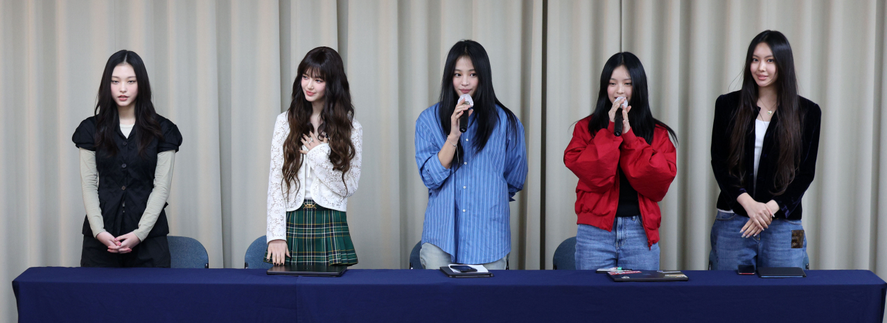 NewJeans spreaks during a press conference held in Seoul to announce their contract termination with Ador, Thursday. (Newsis)