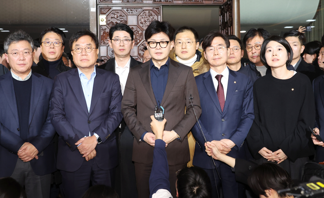 The ruling People Power Party Han Dong-hoon (front, 3rd from left) speaks in the National Assembly main building on Wednesday. (Yonhap)