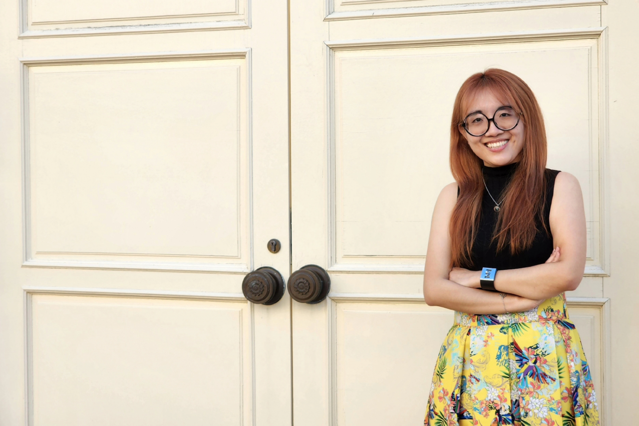 Translator Shanna Tan poses for photos after an interview with The Korea Herald in Singapore in November. (Hwang Dong-hee/The Korea Herald)