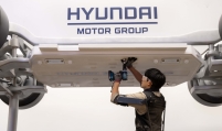 [From the Scene] Hyundai Motor unveils lighter, wearable exoskeleton for heavy lifting