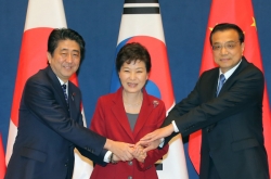 Trilateral summit spurs cooperation momentum