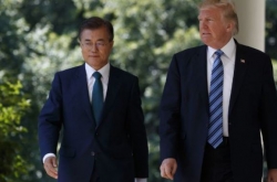 Moon greets Trump at US base