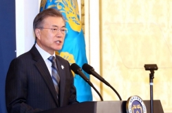 Moon likely to meet N. Korean delegation to Olympics: official