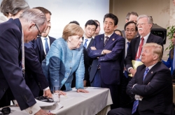 Trump pulls out of joint G-7 statement, attacks Trudeau