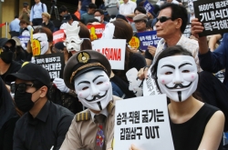 Asiana Airlines workers hold protest over ‘no-meal fiasco’