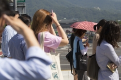 Toddler dies after being left alone in minibus in scorching heat in South Korea