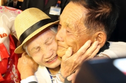 Tears, hugs, joy as family reunions begin