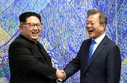 Moon aims to meet Washington and Pyongyang halfway