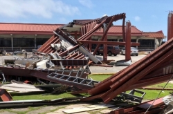 Typhoon crumbles homes, kills 1 in Northern Mariana Islands