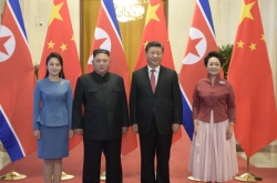 Kim reaffirms commitment to denuclearization in meeting with Xi