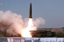 Spy agency says N. Korea's firing of projectiles 