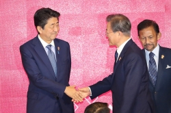 N. Korea threat looms as China, Japan, S. Korea leaders meet