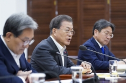 Moon calls for ‘extraordinary’ response to coronavirus outbreak