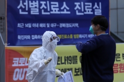 S. Korea reports 242 more cases, total at 7,755