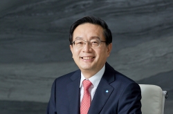 Woori Financial chief seals 2nd term despite opposition