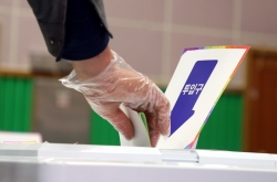 S. Koreans vote amid coronavirus outbreak with higher turnout than before