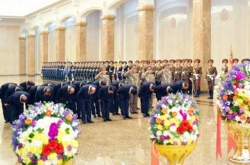 N. Korea makes no mention of visit to mausoleum by leader Kim on late founder's birthday