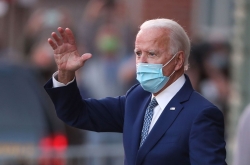 Biden targets virus as transition begins