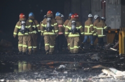 Trapped firefighter found dead in Coupang warehouse