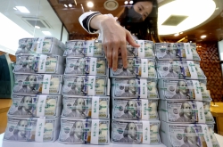 Korea posts biggest drop in dollar reserves since 2008 as won plunges