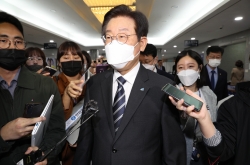 Lee Jae-myung in hot water again, this time over defense stocks