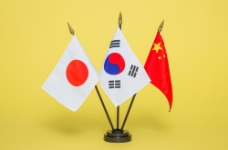 China eases visa rules for S. Korea, Japan amid spat