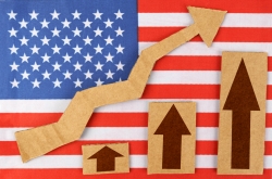US economic growth last quarter is revised up to a 2% annual rate