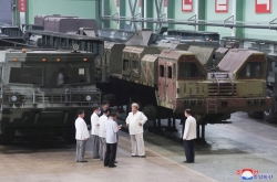 N. Korean leader makes rare visits to key arms factories