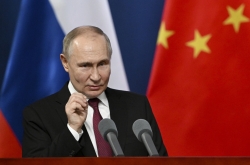 Putin concludes a trip to China by emphasizing its strategic and personal ties to Russia