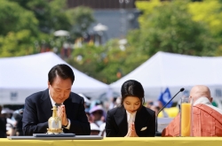 Yoon, first lady celebrate return of Buddhist relics after century