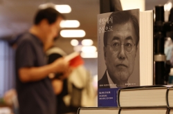 ‘Kim desperately wanted to denuclearize,’ Moon writes in memoirs