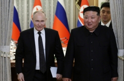 Putin, Kim sign treaty for mutual military support against 'aggression'