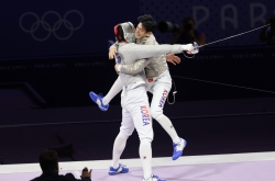 Different members, same result for men's sabre fencing team: gold medal